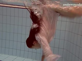 Attractive Underwater Teen Swimming
